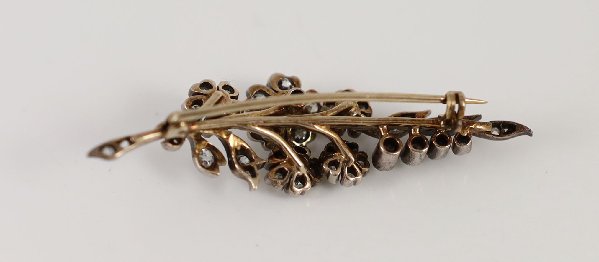 A Victorian gold, silver, diamond and seed pearl set spray brooch